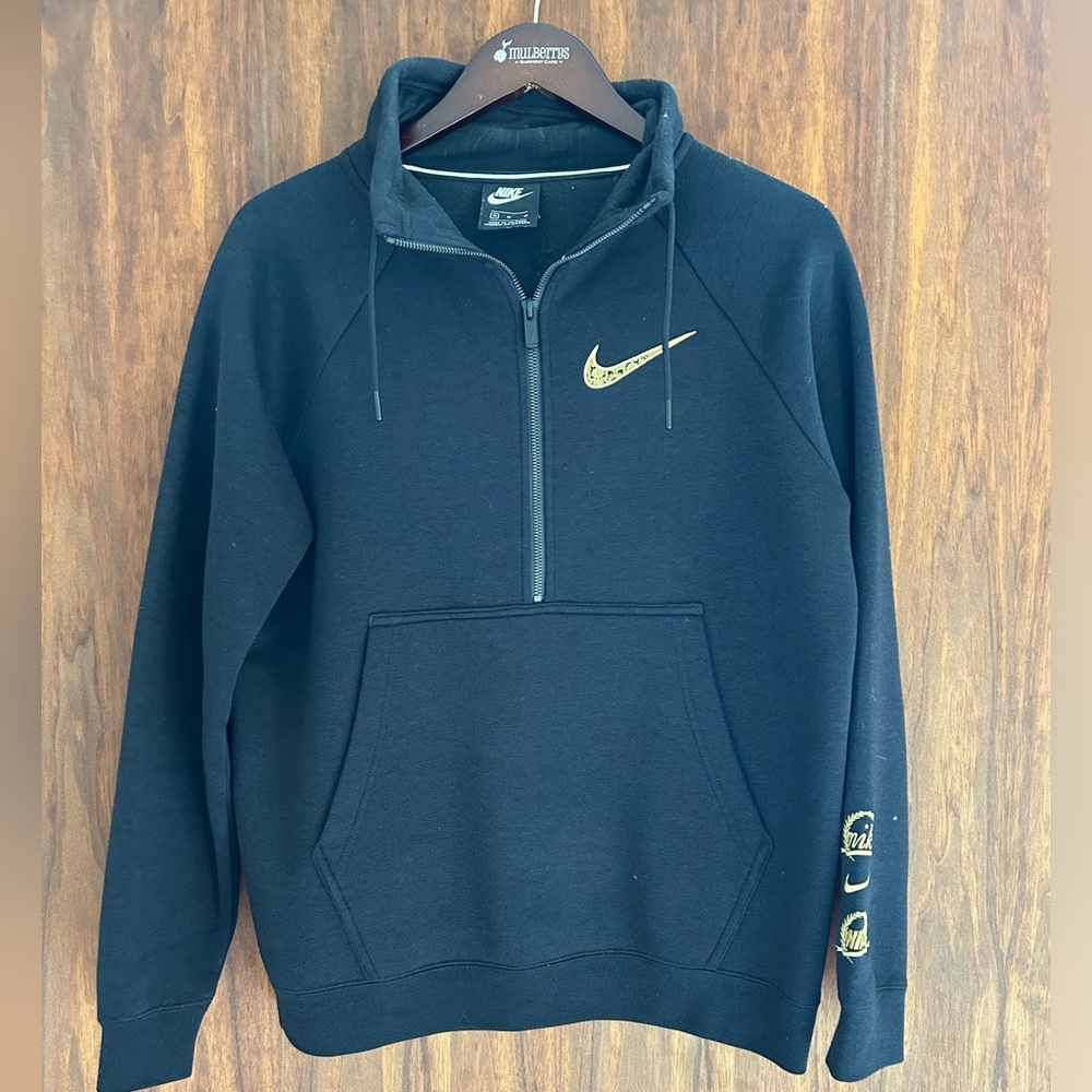 Nike: Black and Gold Woman’s Quarter zip Crewneck Sweatshirt